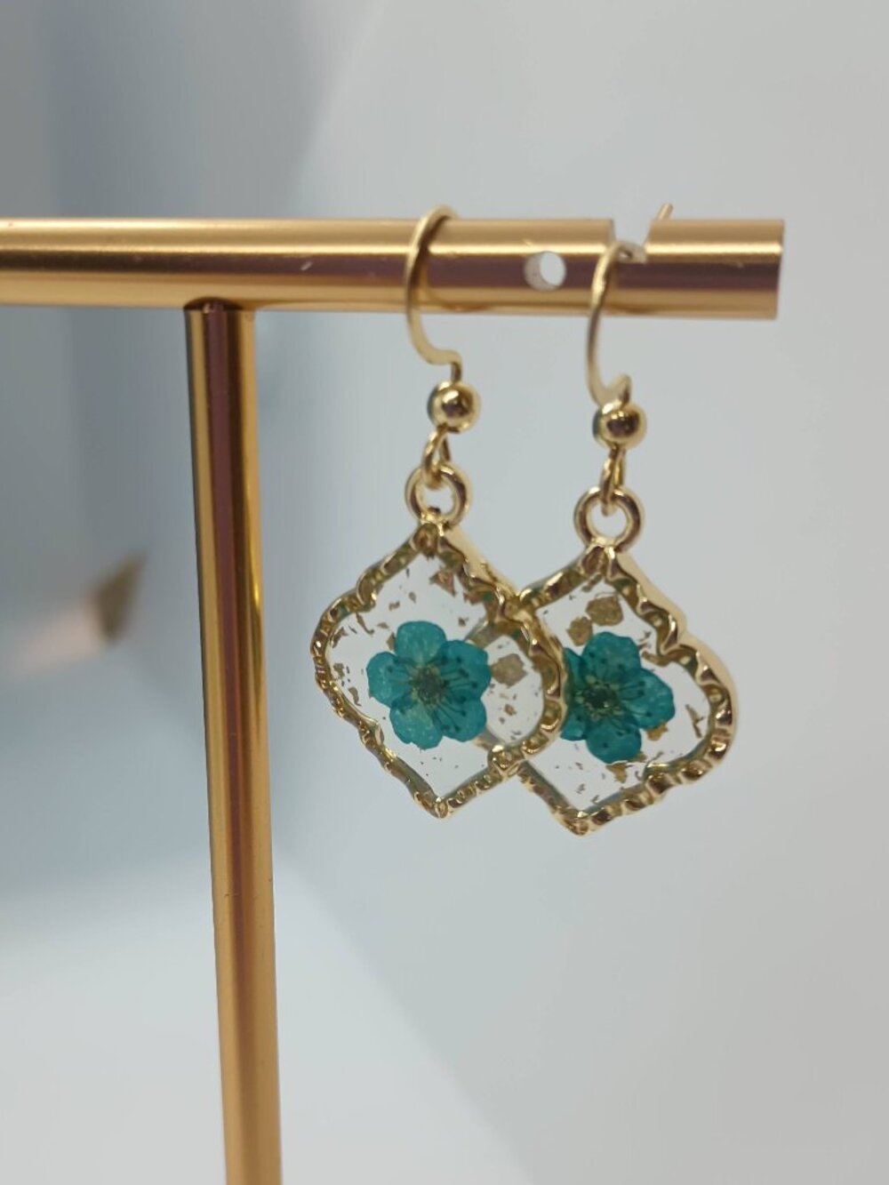 Tiny Blue Dried Flower Earrings in Resin with Gold Trim on Gold Plated Wires